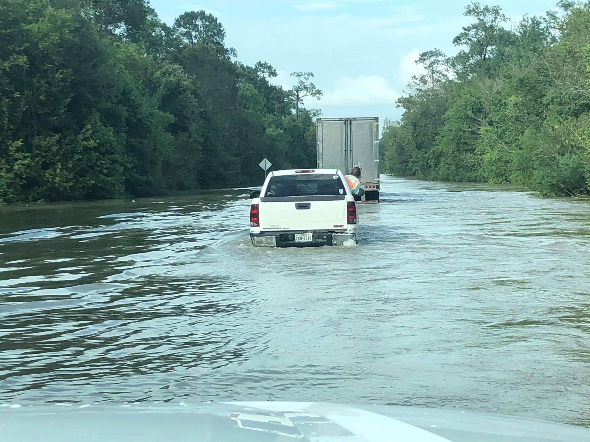 Truck driving through high water